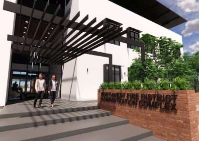 A digitally rendered image shows two people walking out of a modern building labeled "Northwest Fire District Administration Complex" with landscaping and clear skies.